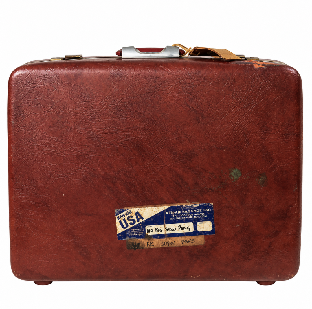 Vintage Burgundy hard-shell suitcase