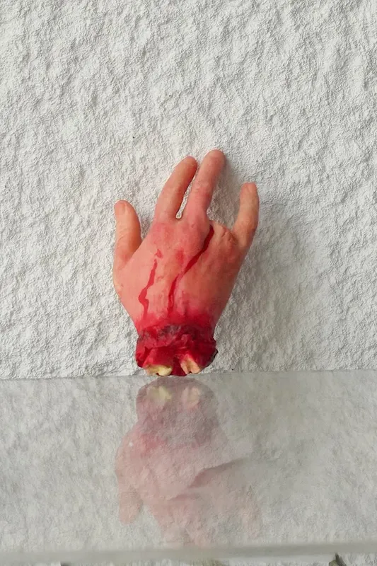 Life size cut off hand with missing finger