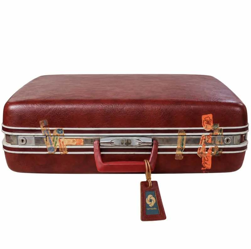 Vintage Burgundy hard-shell suitcase