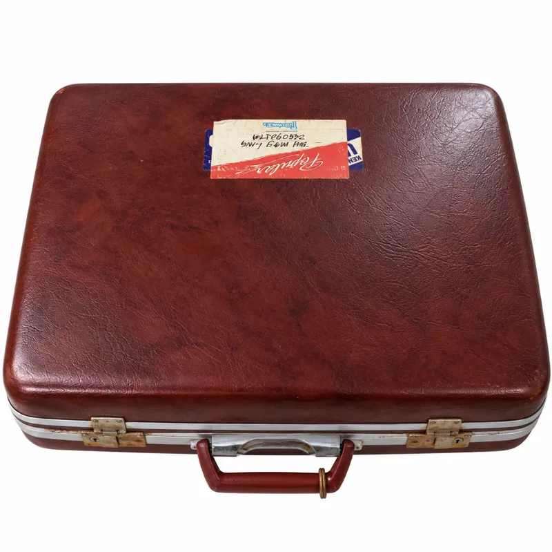 Vintage Burgundy hard-shell suitcase